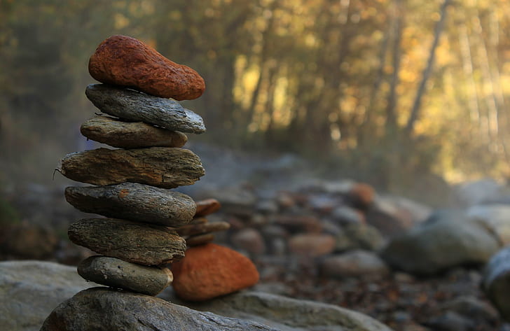 photography of rock balancing, cairn, cairns, valais, suisse