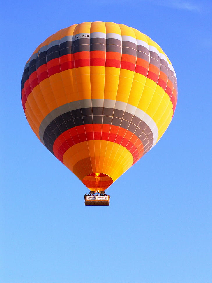 orange, black, and yellow hotair balloon flying on sky, cappadocia, cappadocia, HD wallpaper