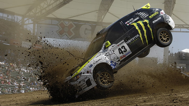 photo of rally car landing on dirt, Ken Block, Subaru, mode of transportation