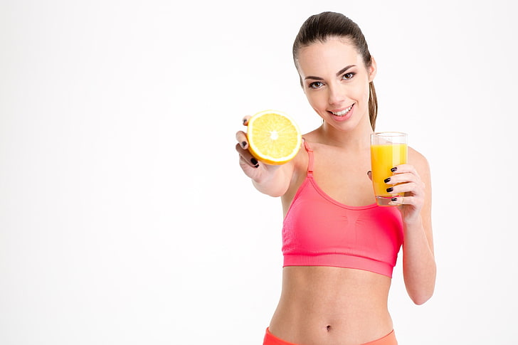 fitness model, fruit, painted nails, white background, smiling