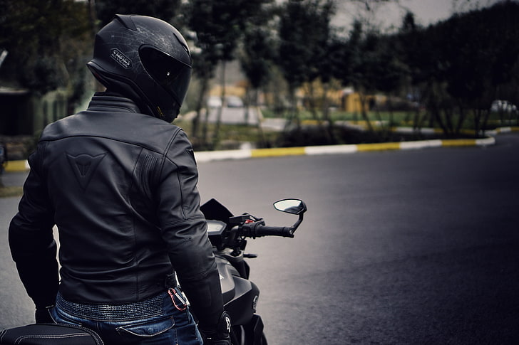 men's black leather jacket and black full-face helmet, motorcycle