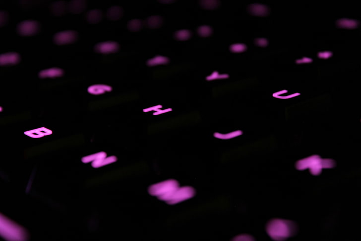 black and purple computer keyboard, close-up photo of computer keyboard