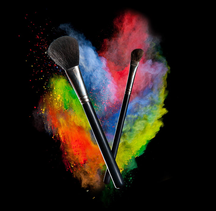 powder explosion, multi colored, studio shot, make-up brush