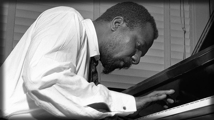 grayscale photography of man playing piano, thelonious monk, face