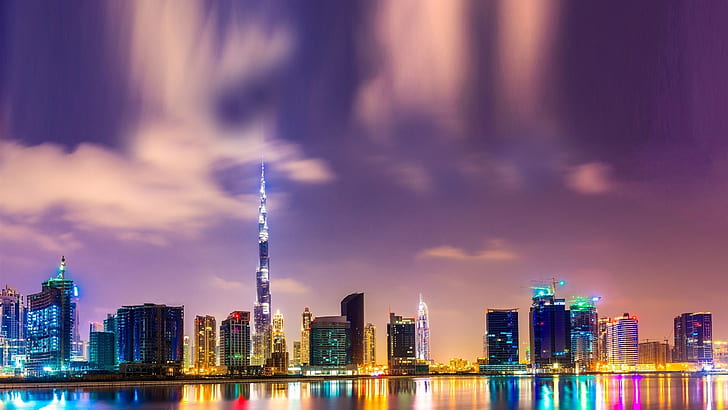 Beautiful night in Dubai, Burj Khalifa, high-rise buildings, lights, water
