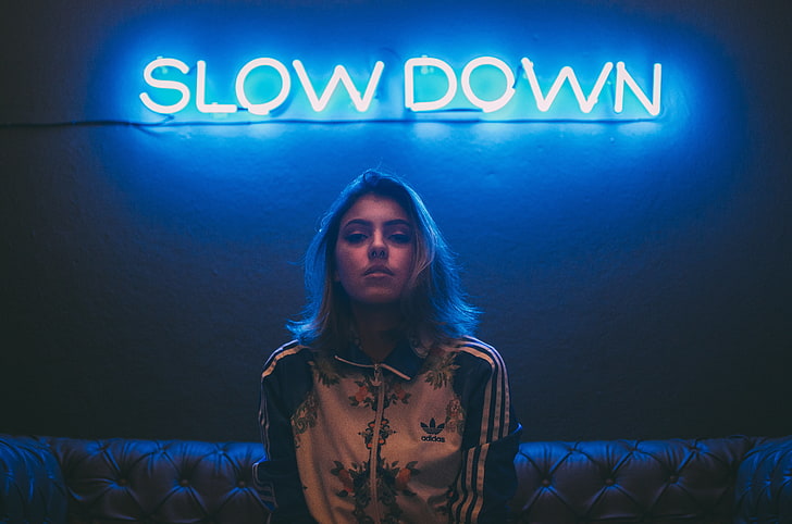 Slow Down movie poster, women, neon, pierced nose, sitting, looking at viewer, HD wallpaper