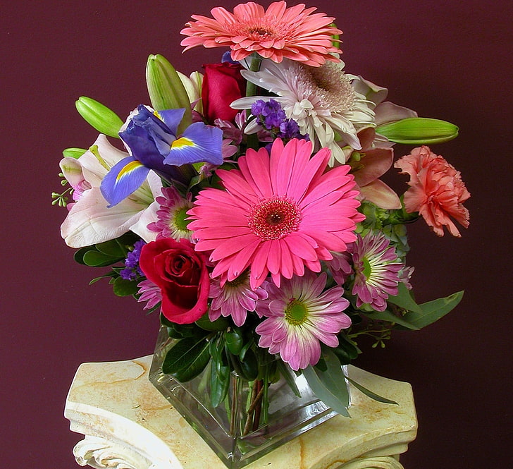 pink and white flower decoration, gerberas, irises, roses, carnation