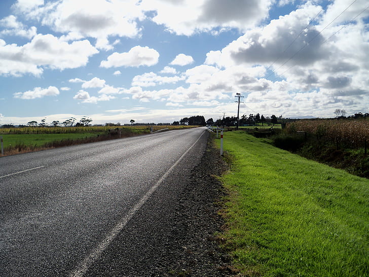 grey asphalt road beside green grass field under cloudy sky, road trip, HD wallpaper