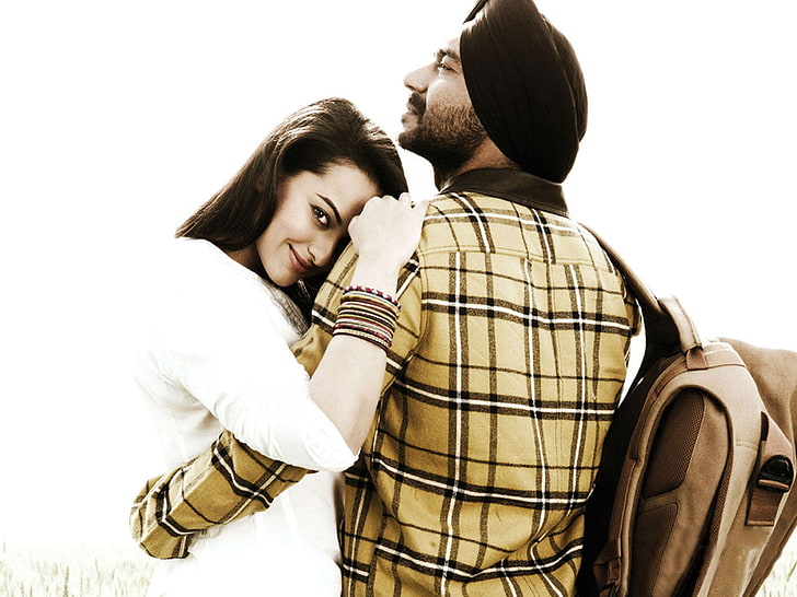 HD wallpaper: Ajay Devgan And Sonakshi Sinha Son O, brown backpack, Movies  | Wallpaper Flare