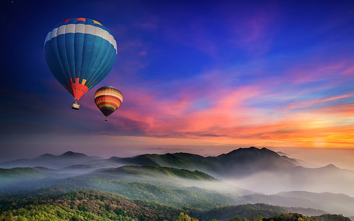 Hot air balloons flying, morning, dawn, sunrise, mountains, fog