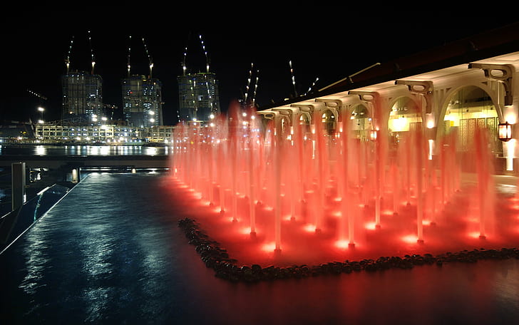 photo of fountain during night time, singapore, singapore, Collyer Quay