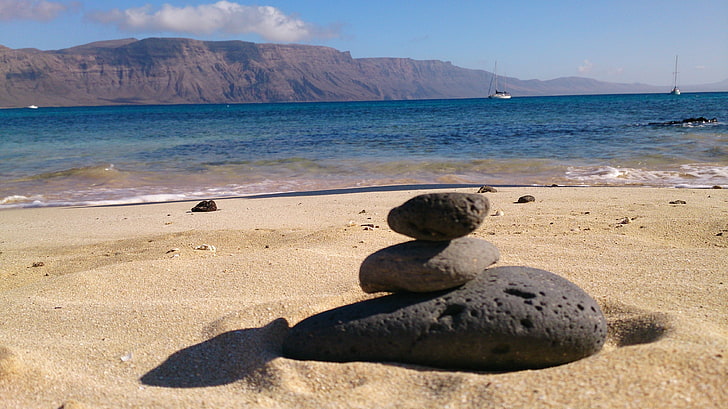 three gray pebbles, beach, stones, Lanzarote, sea, land, water