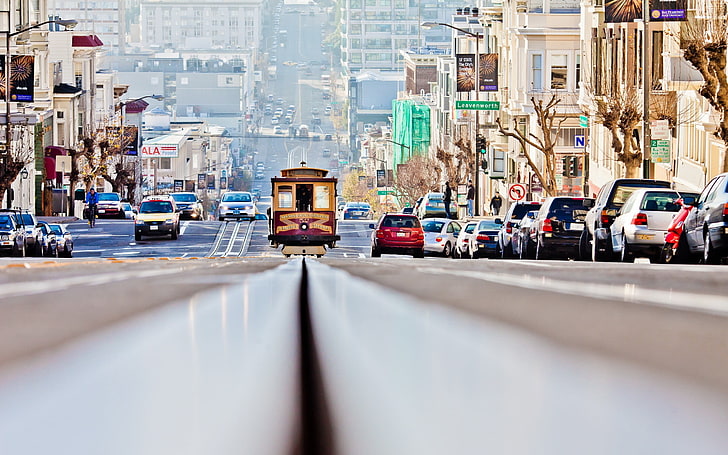 yellow and red train, San Francisco, tram, worm's eye view, traffic