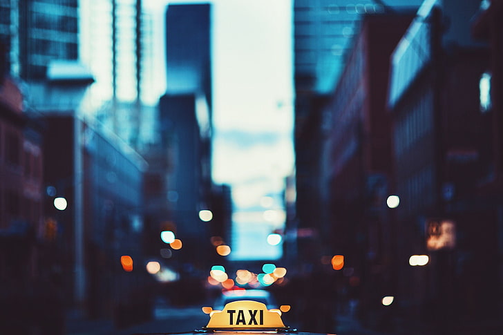 bokeh of taxi, cityscape, night, street, traffic, urban Scene