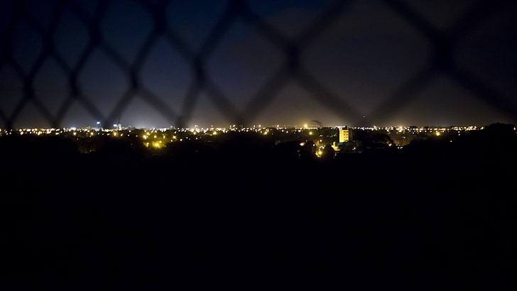 cityscape, fence, night, city lights, illuminated, sky, no people
