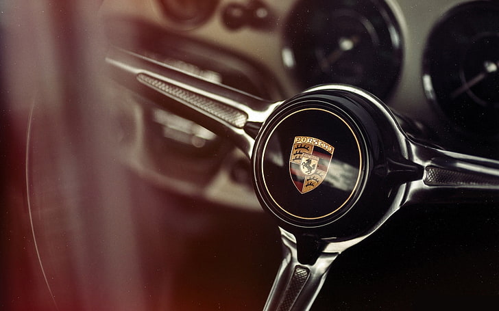selective focus photography of Lamborghini steering wheel, car