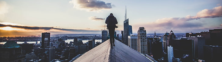 man walking on roof wallpaper, multiple display, cityscape, urban Skyline