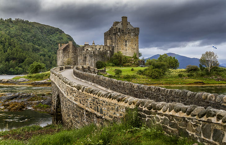 Scotland, Eilean Donan, brown concrete castle, bridge, rocks