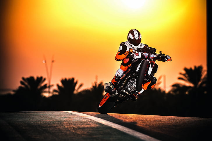 person riding motorcycle on road, KTM 1290 Super Duke R, Sunset