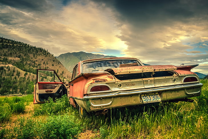 wrecked red car on green grass sunset, Only The Young, explored, HD wallpaper