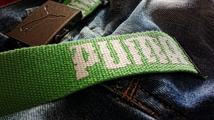 green Puma bag strap, jeans, belt, closeup, textile, green color