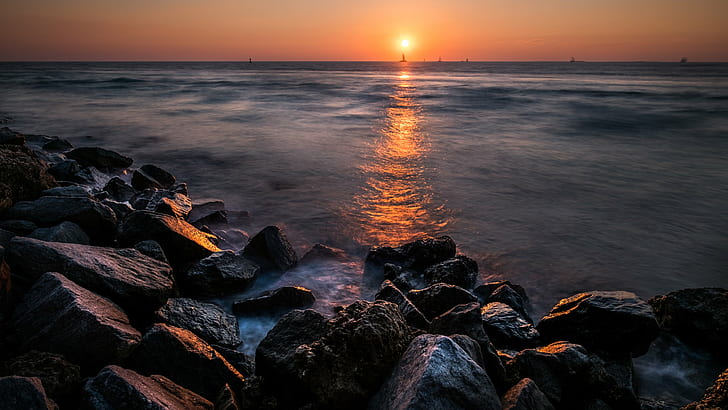 rocky shores across sea during sunset, key west, florida, key west, florida