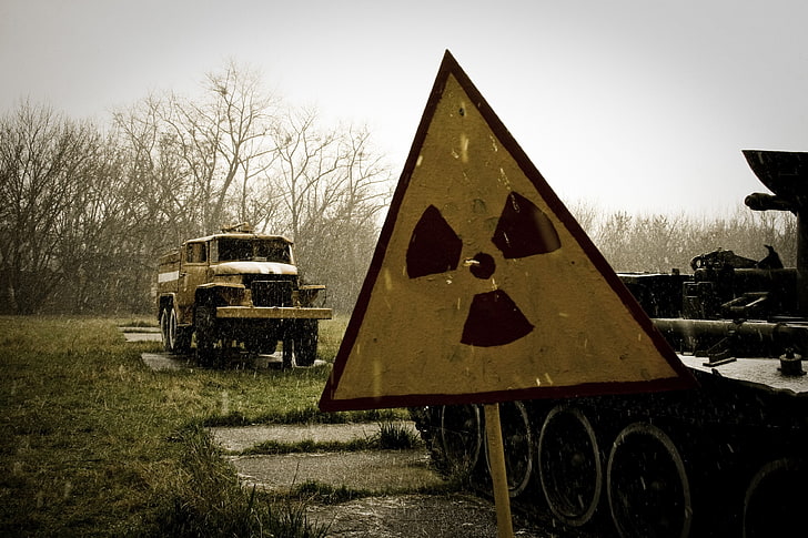 triangular brown signage, rain, radiation, tank, Pripyat, area