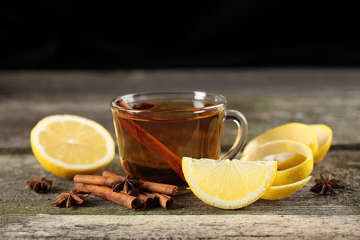 clear glass teacup, lemon, cinnamon, citrus Fruit, drink, table
