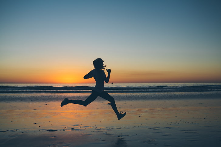 person running on seashore, silhouette, sunset, exercising, beach