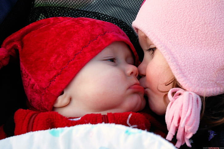 A Sweet Sister., baby's red knit jacket and red cap; girl's pink aviator cap, HD wallpaper