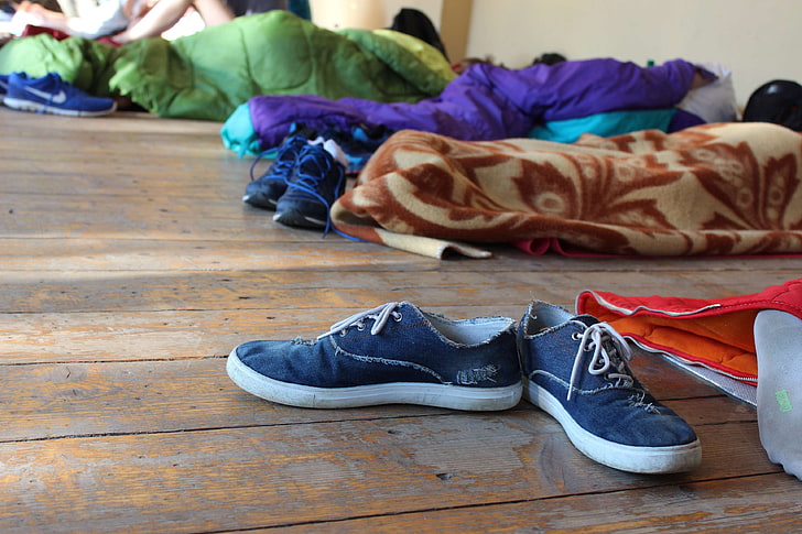 shoes, sleeping bag, youth, pair, indoors, still life, flooring