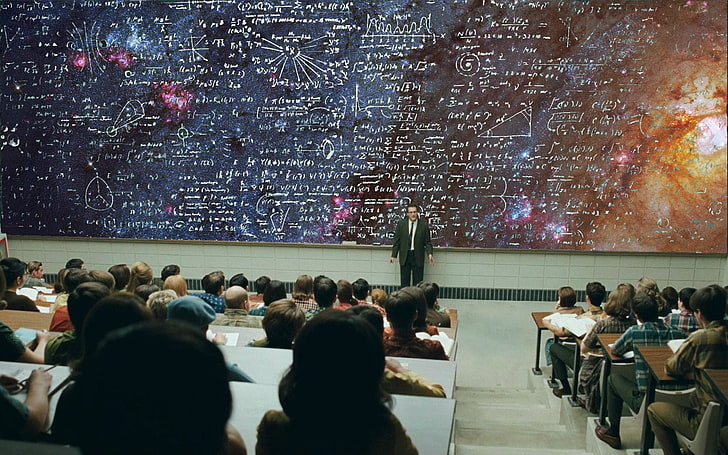 black chalkboard, man standing in front students, blackboard