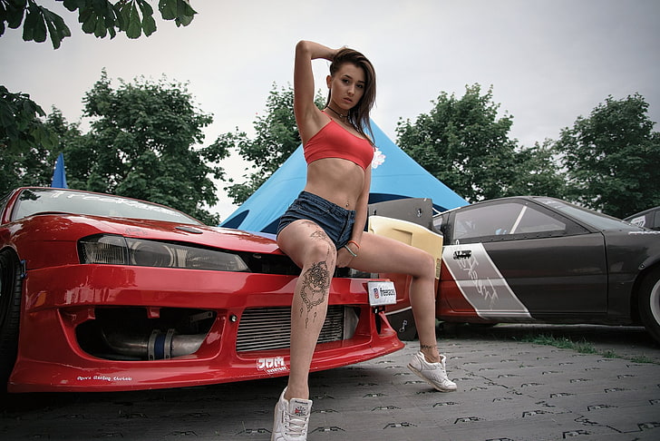 women, tanned, jean shorts, red tops, tattoo, car, women outdoors
