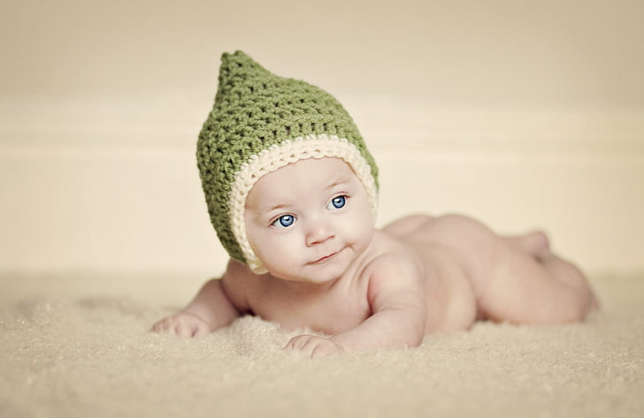baby's green knitted hat, eyes, children, background, widescreen