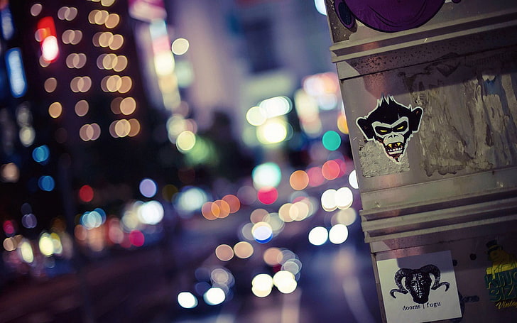 monkey sticker, bokeh photography, urban, city, architecture