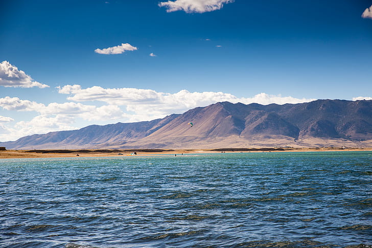 landscape photography of body of water near mountains, Western
