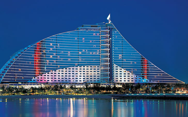 Jumeirah beach hotel Dubai , silver red and blue concrete building