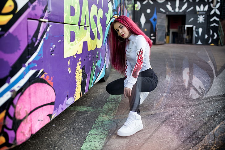 women, dyed hair, portrait, sneakers, squatting, red nails