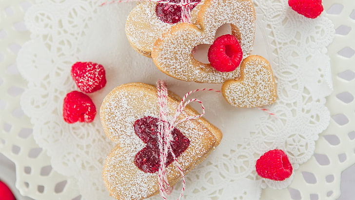 two heart-shaped breads, cookies, raspberries, food, sweet food