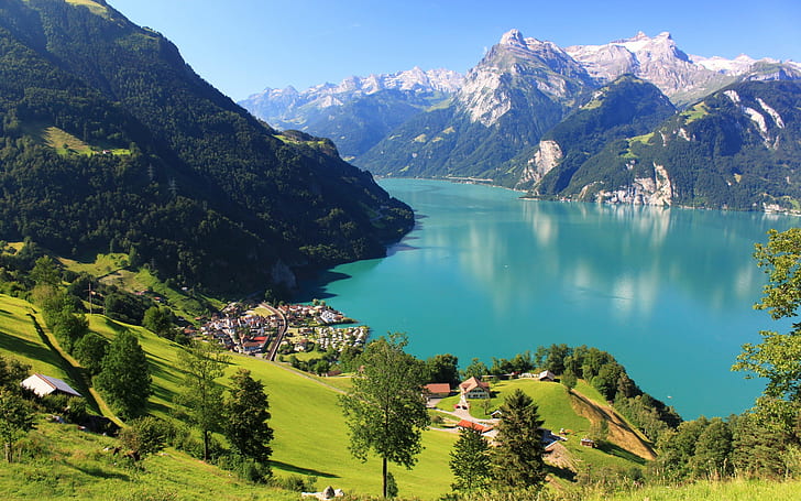 Switzerland Morschach landscape, mountains, rocks, snow, lake, forest, house, blue body of water