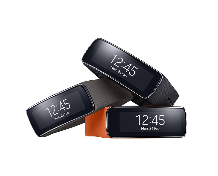 three assorted-color smartwatches, samsung, galaxy, gear fit