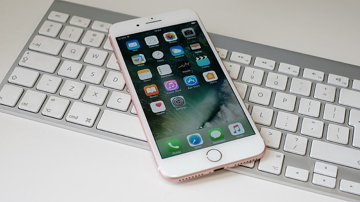 HD wallpaper: iphone 7 plus, white, on keyboard, apple, Technology,  wireless technology | Wallpaper Flare