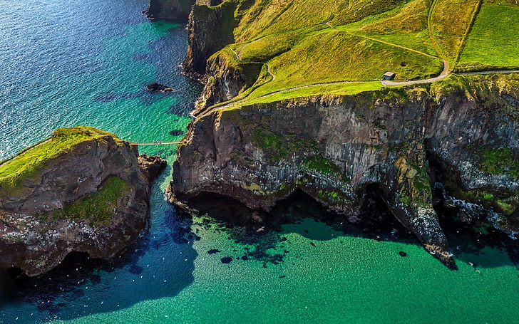 green rock formation, cliff, bridge, grass, island, Ireland, sea