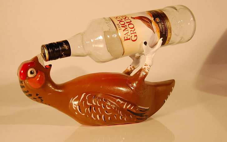 brown bird bottle holder, bottles, whisky, indoors, no people