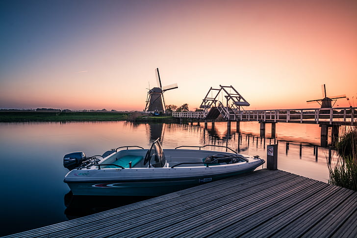 white and  teal motorboat beside brown wooden walk way bridge during sun set, kinderdijk, holland, kinderdijk, holland, HD wallpaper