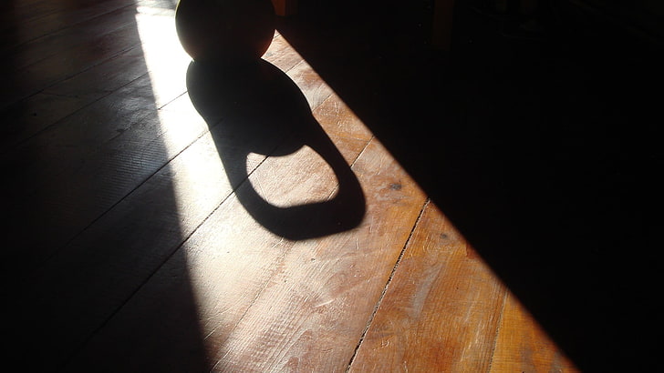 brown wooden floor, photography, kettlebells, shadow, low section