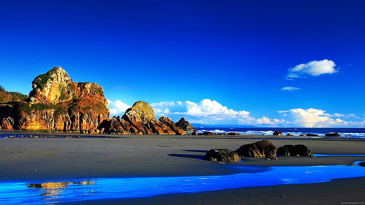Seafront with beautiful colors, brown mountain, landscape, sand