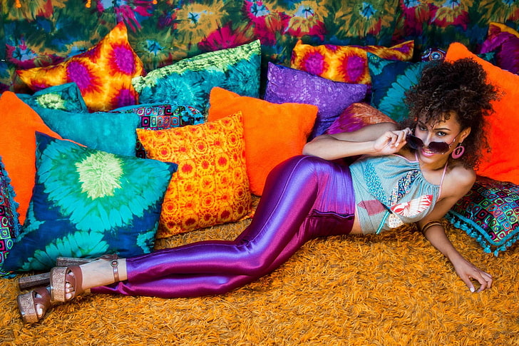 woman wearing purple leggings lying side pillow, brunette, Shanice Jordyn