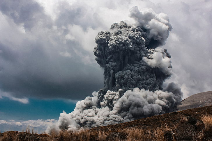 volcano, explosion, smoke, grass, clouds