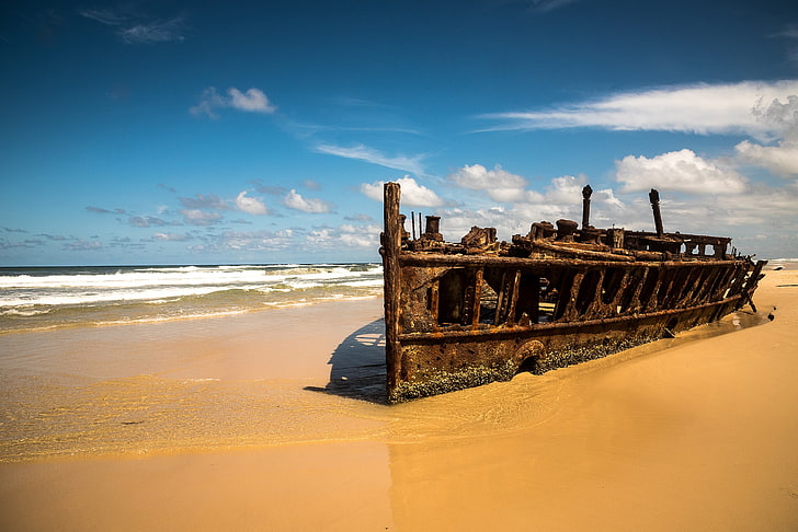 brown shipwreck photo, beach, sea, clouds, blue, sky, boat, sand, HD wallpaper